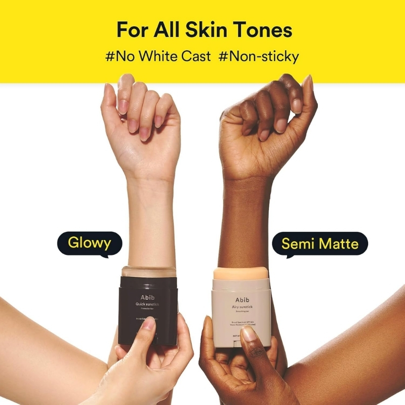 Ad image showing two forearms of different skin tones holding Abib sunscreen sticks labeled 'Glowy' and 'Semi Matte' under a yellow banner that reads 'For All Skin Tones' with hashtags '#No White Cast' and '#Non-sticky'.