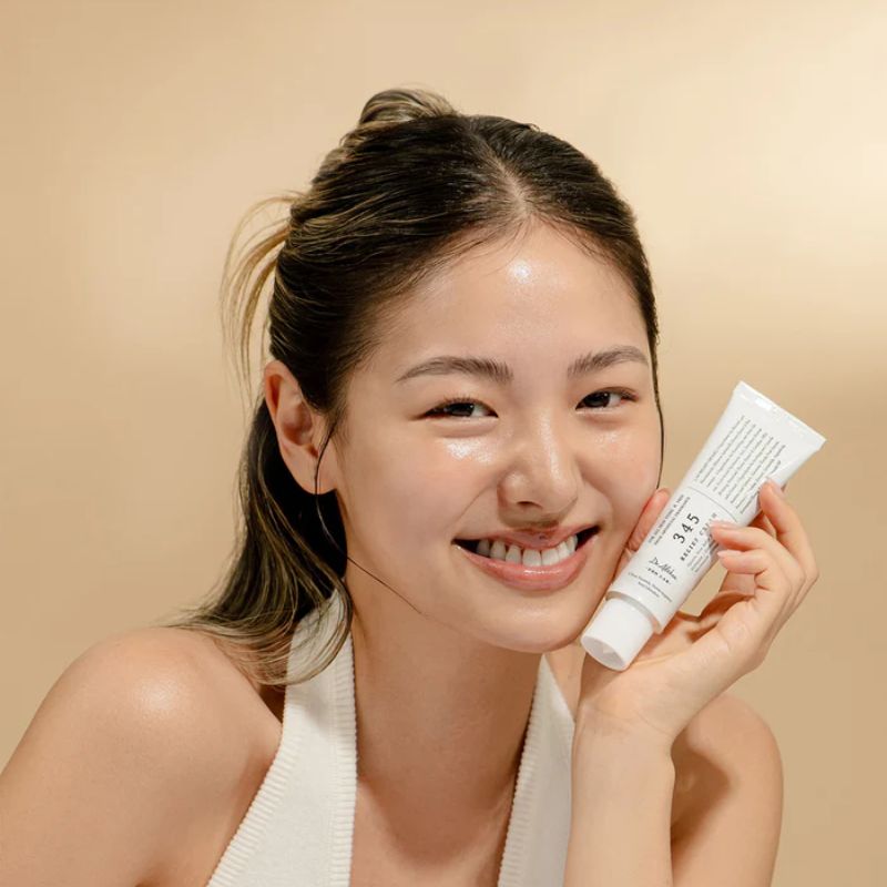 Dr. Althea Resveratrol 345NA Intensive Repair Cream in a sleek white tube, displayed against a clean background, emphasizing its sophisticated packaging and skincare benefits.