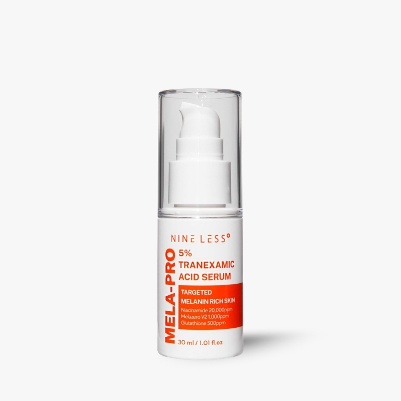 White pump bottle of MELA-PRO 5% Tranexamic Acid Serum for melanin-rich skin, 30 ml, with orange label on a white background.