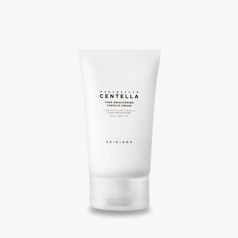 White squeeze tube of Centella Tone Brightening Capsule Cream by Skin1004, standing upright against a pale background.