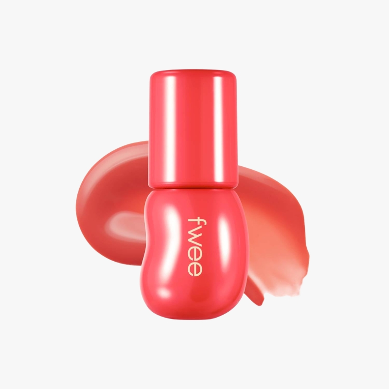 Red-puchsia nail polish bottle with smeared swatch in the background; brand 'fivee' visible on the bottle edge.