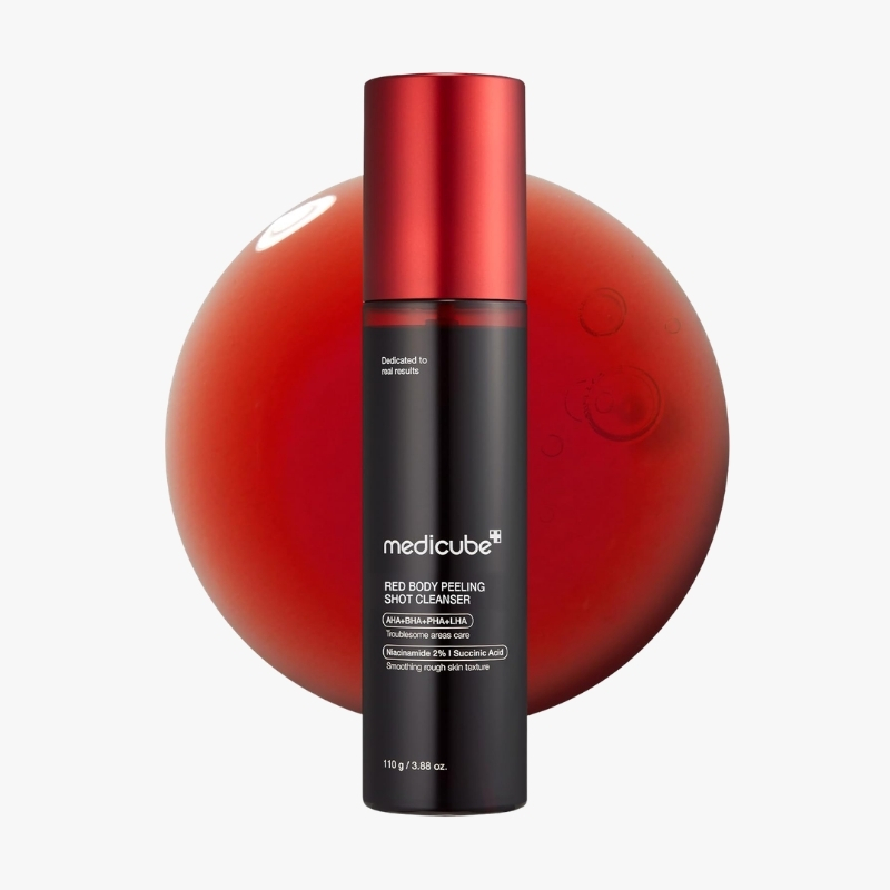 Medicube Red Body Peeling Shot Cleanser bottle with red cap against a red circular background.