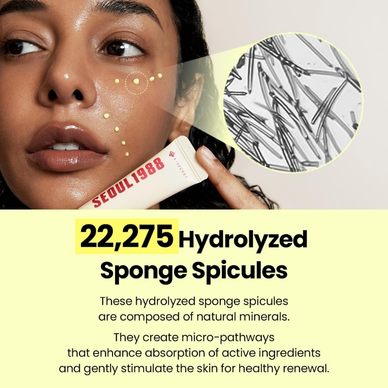 Close-up of a woman squeezing a tube labeled 'SEoul 1988' onto her cheek, with a magnified circular inset of sponge spicules; yellow background features bold text about 22,275 hydrolyzed sponge spicules and skin-renewal benefits.