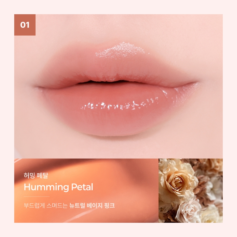 Close-up of glossy peach-pink lips with a small orange '01' tag in the top-left, plus a lower banner reading 'Humming Petal' with Korean text and a rose image.