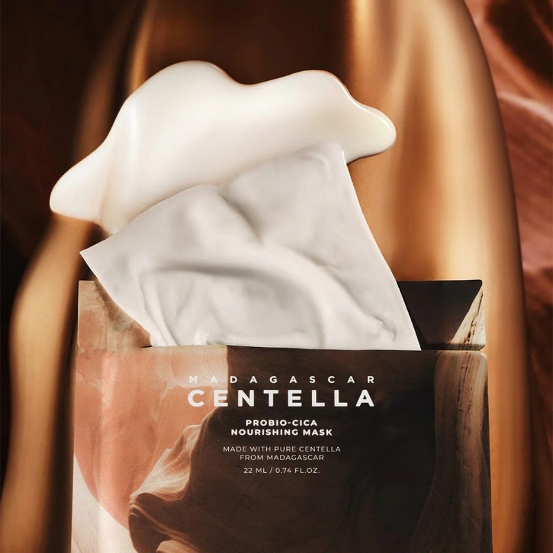 Centella Madagascar Probio-Cica Nourishing Mask box with a tissue pulled out and a creamy foam on top