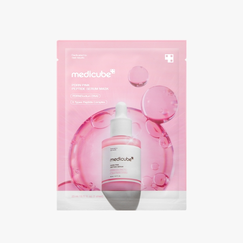 Front of a Medcube PDRN Pink Peptide Serum Mask sachet with a pink serum bottle on a pink bubbly background, showcasing skincare packaging.