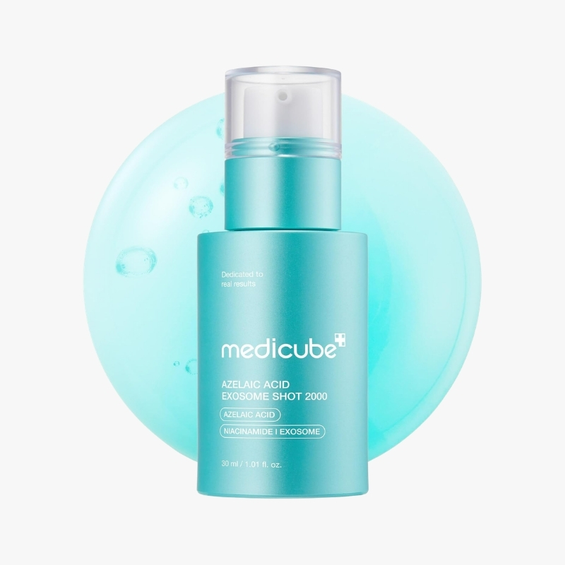 Turquoise Medicube skincare bottle labeled Azelaic Acid Exosome Shot 2000 with a pump cap against a pale blue circular backdrop.