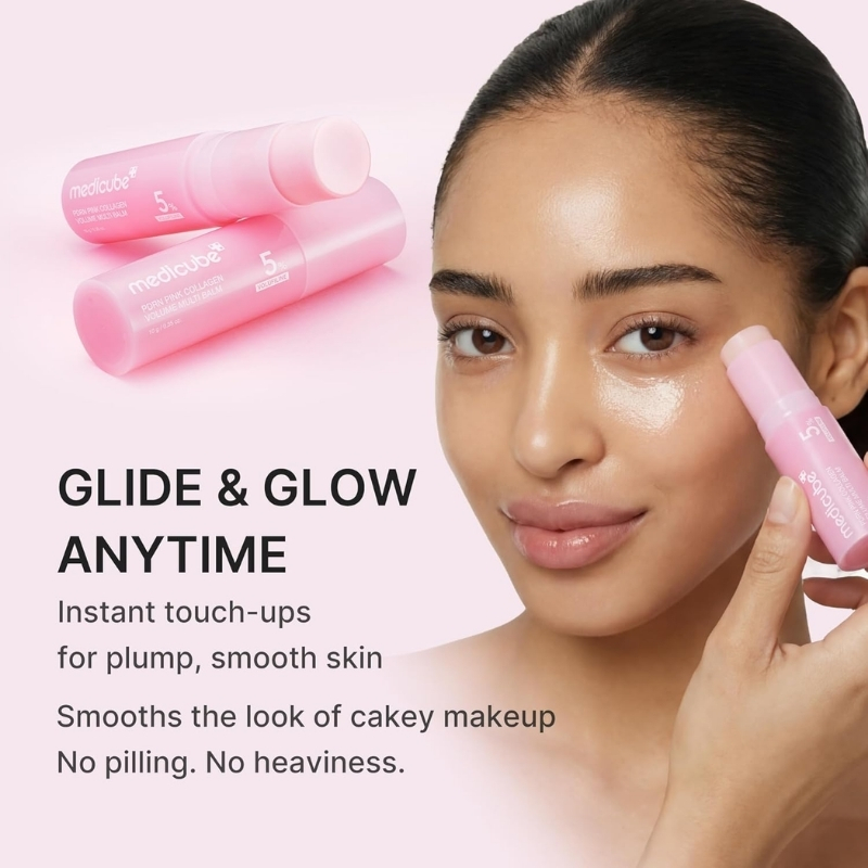 Model applying pink skincare product to cheek, promoting instant touch-ups for smooth, glowing skin.